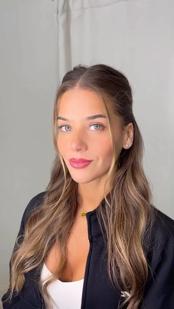 Studio portrait — Sculpt Society team member in a black blazer