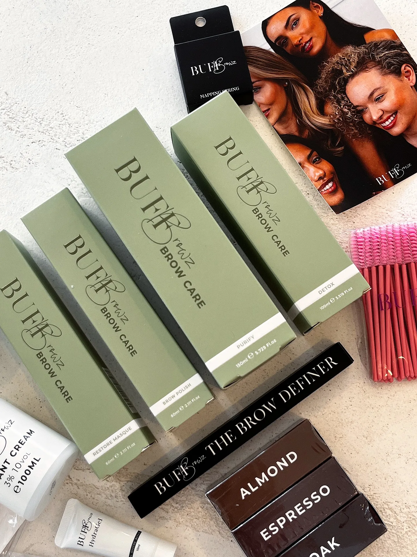 BUFF Brow Definer product flat-lay with shade labels — Almond, Espresso and Oak